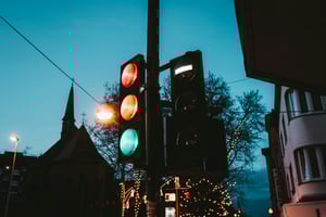 traffic lights and a dusky night sky