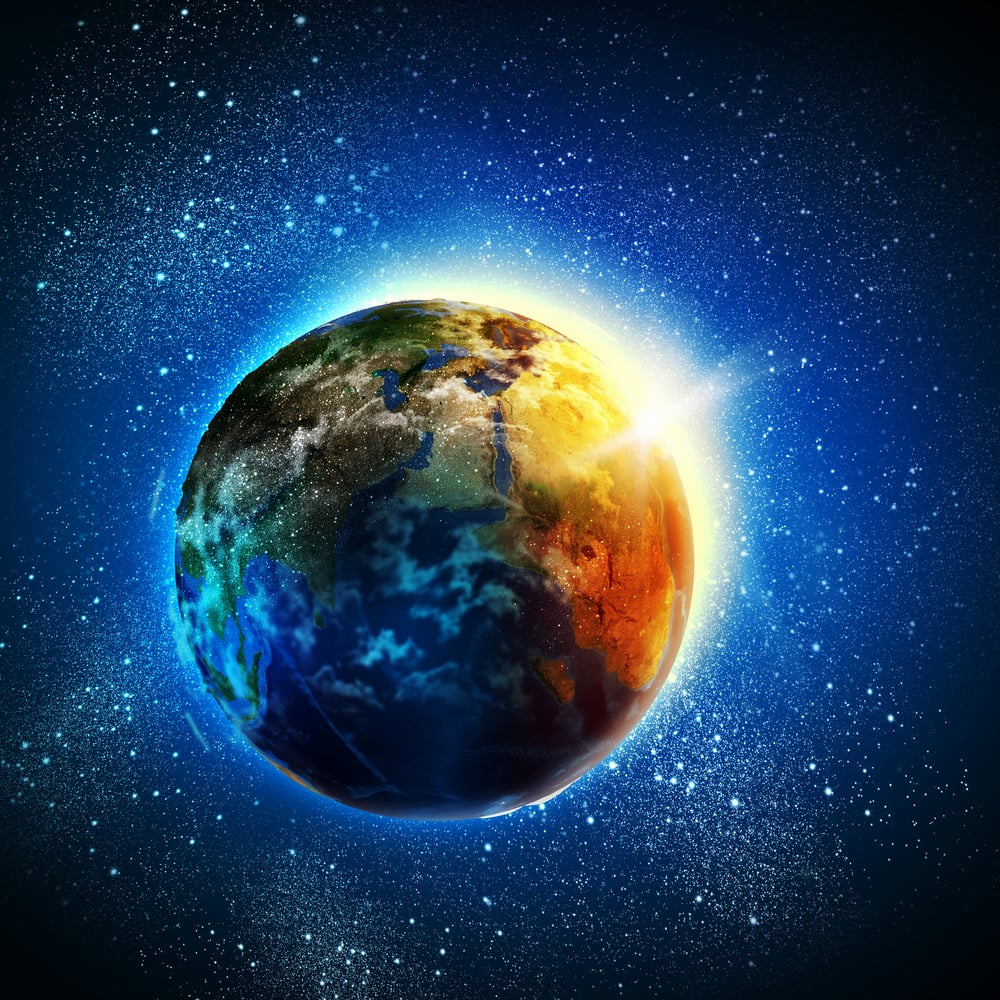 Earth planet in sun rays. Elements of this image are furnished by NASA